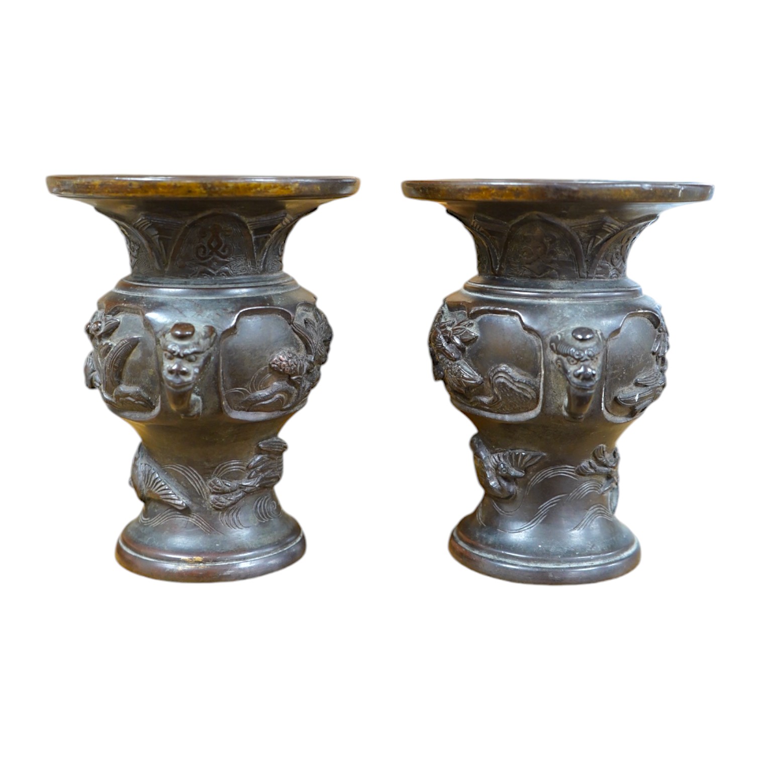 A pair of Japanese bronze vases, Meiji period, one signed, one lacking base, 13cm. Condition - fair